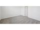 Bedroom features gray carpet, white walls, and an open door at 2770 Virginia Pine Dr, Bartow, FL 33830