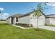 New construction, one story home features a two-car garage and a fresh lawn at 2770 Virginia Pine Dr, Bartow, FL 33830