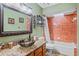 Bathroom features an ornate sink and a shower-tub combo with unique tile at 283 Haverclub Ct, Longwood, FL 32779