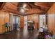Cozy bonus room with wood-look floors, a vaulted ceiling, and a game table, perfect for recreation at 283 Haverclub Ct, Longwood, FL 32779