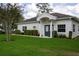 Charming community clubhouse with well-manicured lawn and inviting entrance at 283 Haverclub Ct, Longwood, FL 32779