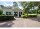 Attractive clubhouse with a welcoming entrance and meticulous landscaping at 283 Haverclub Ct, Longwood, FL 32779