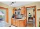 Kitchen featuring granite countertops, stainless steel appliances, and wood cabinets at 283 Haverclub Ct, Longwood, FL 32779