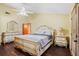 Spacious main bedroom with decorative furnishings, ceiling fan, and dark wood-look floors at 283 Haverclub Ct, Longwood, FL 32779