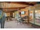 Covered patio includes an outdoor bar and seating, along with a mounted television at 283 Haverclub Ct, Longwood, FL 32779