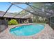 Beautiful screened-in pool surrounded by brick paving, plants and patio seating for entertaining at 283 Haverclub Ct, Longwood, FL 32779