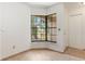 Bright dining area featuring a corner window and tile flooring leading into the entry hallway at 2838 Maldive Ct, Deltona, FL 32738