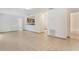 Open-concept living space featuring tile floors and an opening to the kitchen at 2838 Maldive Ct, Deltona, FL 32738