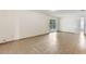 Bright living space with tile flooring and sliding glass doors to the backyard at 2838 Maldive Ct, Deltona, FL 32738