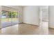 Living space with sliding glass doors opening to an outdoor patio at 2838 Maldive Ct, Deltona, FL 32738