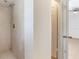Shower featuring neutral tiles and a chrome shower head at 2838 Maldive Ct, Deltona, FL 32738