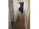Hallway leading to bedroom at 310 W Lake Ave, Auburndale, FL 33823