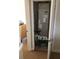 Utility closet features a modern Carrier air handler at 310 W Lake Ave, Auburndale, FL 33823