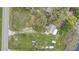An aerial view of the home and large lot featuring a spacious yard at 369 Bluff Lake Rd, Mascotte, FL 34753