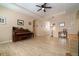 Inviting living room showcasing hardwood floors, neutral paint, and archway details at 3896 Esplanade Ave, Port Orange, FL 32129