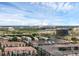 Aerial view of neighborhood and attractions including a lake and a large ferris wheel at 4804 Cayview Ave # 20512, Orlando, FL 32819