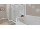 Bathroom with soaking tub and glass shower enclosure at 4804 Cayview Ave # 20512, Orlando, FL 32819