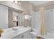 Bright bathroom featuring a shower-tub combination, a white vanity, and tile flooring at 4804 Cayview Ave # 20512, Orlando, FL 32819