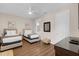 Bright bedroom featuring two twin beds, a ceiling fan, and light colored walls at 4804 Cayview Ave # 20512, Orlando, FL 32819