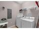 Convenient laundry room equipped with modern appliances and ample storage at 4804 Cayview Ave # 20512, Orlando, FL 32819