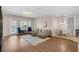 Bright living room featuring hardwood floors, a comfortable sofa and stylish decor at 4804 Cayview Ave # 20512, Orlando, FL 32819