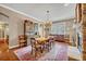 Dining area featuring a fireplace, chandelier, and a hutch at 513 Legacy Park Dr, Casselberry, FL 32707
