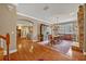 Charming dining room with hardwood floors, ample natural light, and seamlessly connects to the kitchen and living areas at 513 Legacy Park Dr, Casselberry, FL 32707