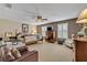 An expansive main bedroom has neutral carpet and plantation shutters at 513 Legacy Park Dr, Casselberry, FL 32707