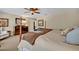 An expansive main bedroom has neutral carpet and light, neutral-colored walls at 513 Legacy Park Dr, Casselberry, FL 32707