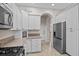 Well-maintained kitchen featuring stainless steel appliances and plenty of storage at 5339 Pond Crossing Pl, Leesburg, FL 34748