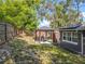Backyard featuring a shaded gazebo that creates a private outdoor living space, perfect for relaxation and entertaining at 604 Thrush Ave, Longwood, FL 32750