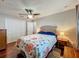 Comfortable bedroom with closet space, overhead lighting, and floral-patterned bedding at 604 Thrush Ave, Longwood, FL 32750