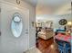 The entryway shows a view into the living area, showing the open-concept layout and decor at 604 Thrush Ave, Longwood, FL 32750