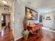 Hallway area features decor elements, art pieces and access to bedrooms, living room and front door at 604 Thrush Ave, Longwood, FL 32750