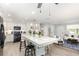 Spacious kitchen with an open floor plan, and modern white cabinets at 692 Gaslight Dr, South Daytona, FL 32119