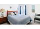 Cozy bedroom with warm lighting and comfortable furnishings at 7161 Sw 135Th Pl, Ocala, FL 34473