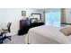 Comfortable bedroom with natural light and dark wood dresser at 7161 Sw 135Th Pl, Ocala, FL 34473