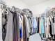 Spacious walk-in closet with wire shelving perfect for storage at 7161 Sw 135Th Pl, Ocala, FL 34473