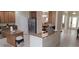 Kitchen featuring granite countertops, stainless steel appliances, and a functional layout with a kitchen island at 844 Suffolk Pl, Davenport, FL 33896
