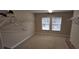 Empty walk-in closet offering ample storage space with shelving and hanging racks at 844 Suffolk Pl, Davenport, FL 33896