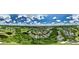 Panoramic aerial view showcasing neighborhood location, golf courses, and community amenities at 922 Jasmine St, Celebration, FL 34747