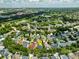An aerial view of the neighborhood, highlighting the property's location among lush greenery and community amenities at 922 Jasmine St, Celebration, FL 34747