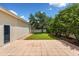 Paver patio and yard offer a private space for outdoor enjoyment and entertaining at 922 Jasmine St, Celebration, FL 34747