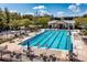 An inviting community pool with lap lanes, sun loungers, and shaded seating areas at 922 Jasmine St, Celebration, FL 34747