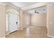 Bright foyer with tile flooring, neutral walls, and a welcoming front door at 922 Jasmine St, Celebration, FL 34747