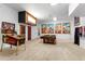 Spacious game room features a pool table, Elvis pinball machine, and vintage cartoon decor at 922 Jasmine St, Celebration, FL 34747