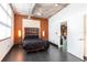 Modern bedroom featuring an exposed ceiling and sleek tile floors at 10 N Summerlin Ave # 14, Orlando, FL 32801