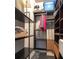 Walk-in closet with custom shelving and ample storage space at 10 N Summerlin Ave # 14, Orlando, FL 32801