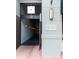 The entrance featuring modern design elements, decorative lighting, secured doorway, and the building's street address at 10 N Summerlin Ave # 14, Orlando, FL 32801