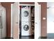 Laundry room with stacked washer and dryer at 10 N Summerlin Ave # 14, Orlando, FL 32801